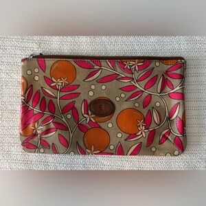 Floral and orange Fossil pouch